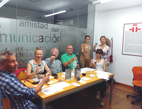 Dénia, destination to study Spanish and eat well Students giving during the wine workshop at school