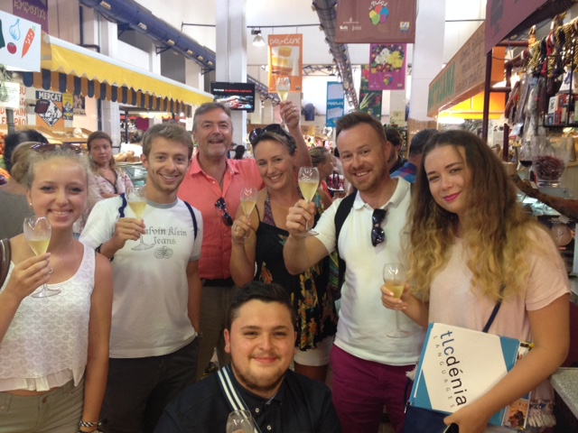 Dénia, destination to study Spanish and eat well Spanish students in the main market in Denia